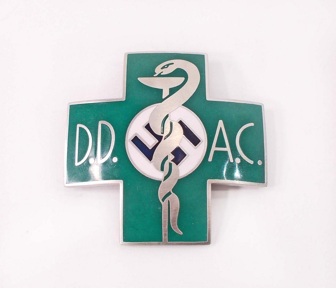 GERMAN MEDICAL DD AC DOCTORS BREAST BADGE: Measures 1 7/8" wide by 1 7/8" tall. The front of the maltese shows a snake wrapped around a beaker. It reads 'DD AC'. The reverse side is maker marked 'Carl Poellath Schrobenhausen'. It is also numbe