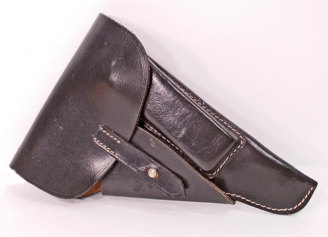 GERMAN NAZI MAUSER P-38 LEATHER PISTOL HOLSTER: Measures 6 5/8" wide by 9 7/8" tall. The reverse side is marked 'P-38 gxy 1944'. It is also marked with a waffen ampt eagle and has 'WaA280' below. Multi piece machine sewn black leather construction.