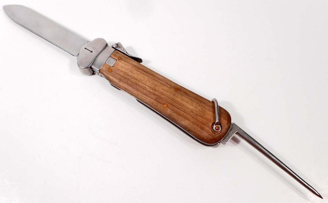GERMAN NAZI LUFTWAFFE PARATROOPER FALLSCHIRMJAGER: Measures 10 1/8" long overall with the blade open. The steel blade measures 13/16" wide by 3 15/16" long. The spike is maker marked 'R B Nr 0/0561/0019' on One (1) side. It also has the waffen ampt ea