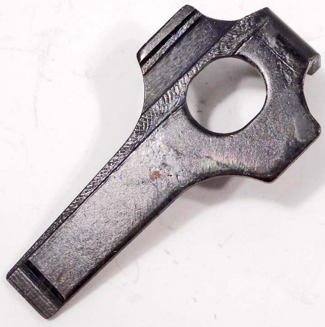 GERMAN PARABELLUM P O 8 LUGER PISTOL LOADING/ TAKE DOWN: Measures 1" wide by 1 15/16" long. The piece is stamped with a waffen ampt eagle and is marked 'WaA 140' below. Machined blued steel construction.