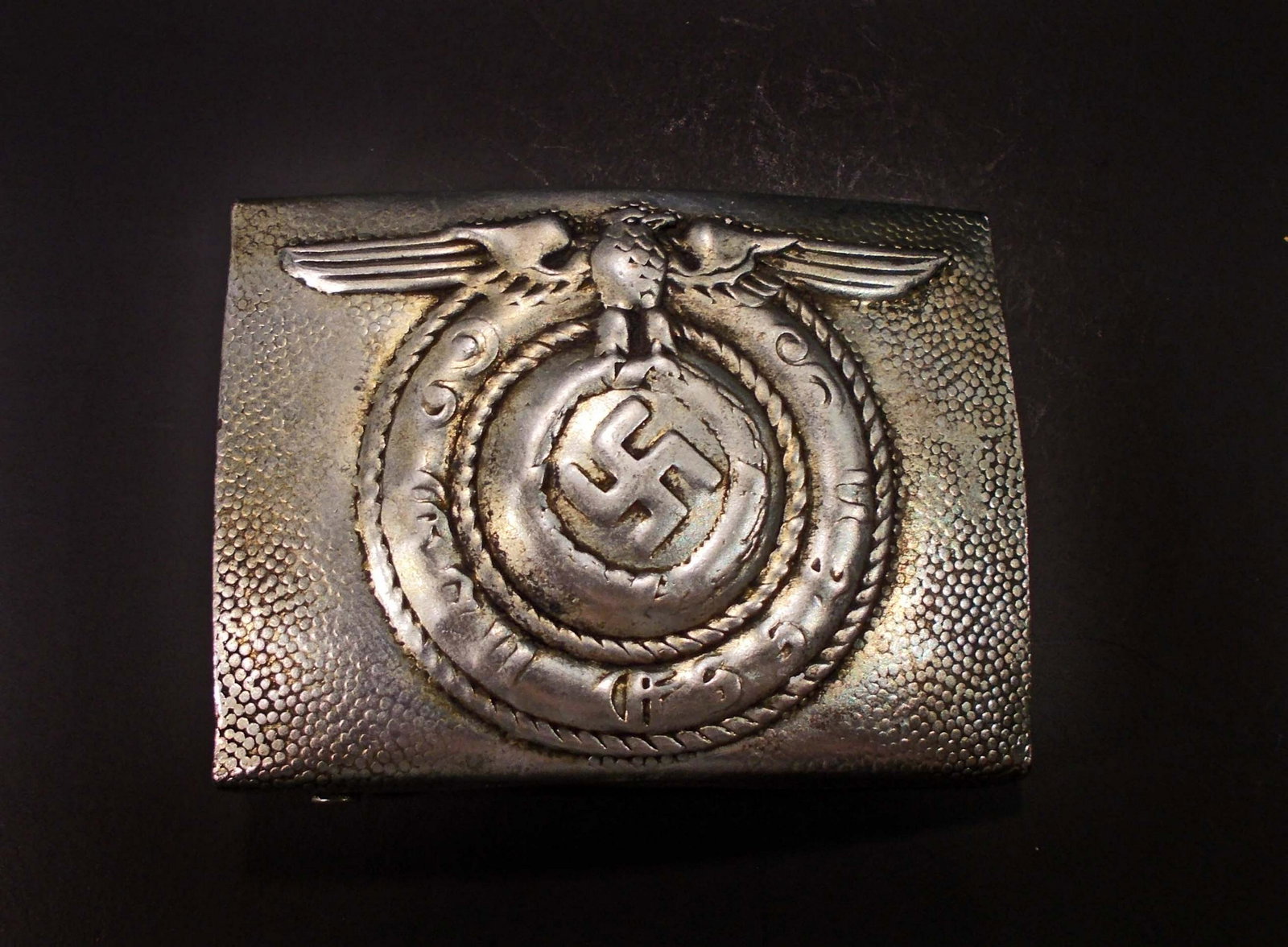GERMAN NAZI WAFFEN SS GAU ESSEN ENLISTED MANS BELT: Front reads Gau Essen. There is a Waffen SS eagle above. The reverse side is maker marked A a & s. Mid war stamped steel construction.