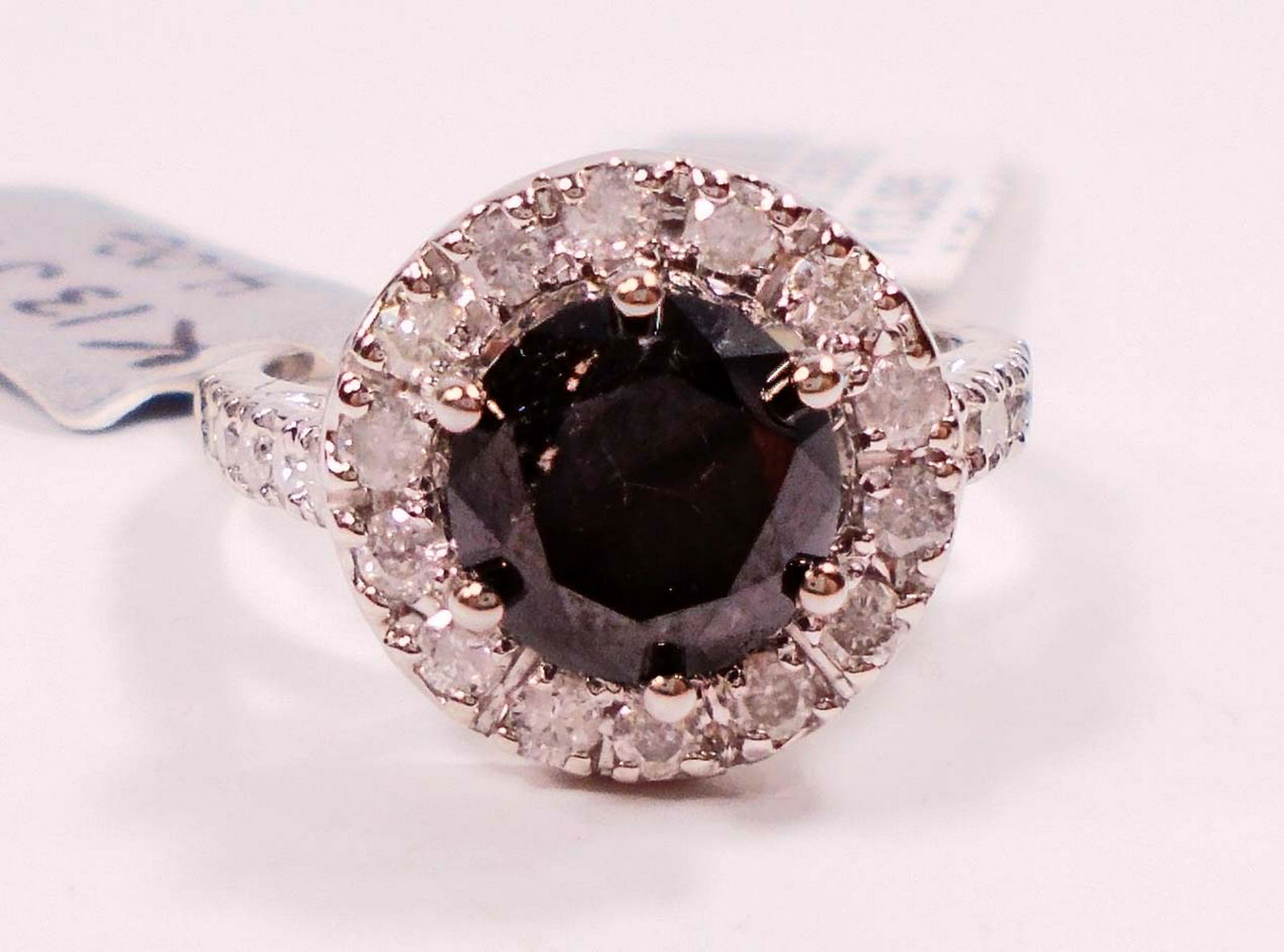 14 K WHITE GOLD BLACK & WHITE DIAMOND LADIES RING -: 2.04 cts Black diamonds and 0.57 cts diamonds. Comes with GLA Appraisal $6,804.00