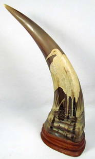 VINTAGE CARVED HORN MOUNTED ON WOOD BASE - SIGNED -: Approx. 15" tall.