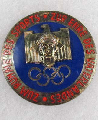 GERMAN NAZI 1936 BERLIN OLYMPICS BADGE: Maker marked W A & Co Munchen. Enamel construction. Pin back.