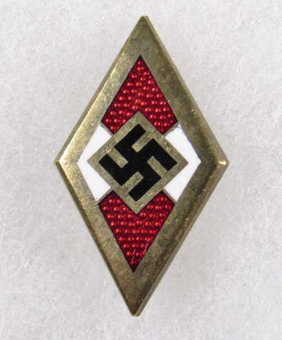 GERMAN NAZI GOLDEN HITLER YOUTH JH HONOR BADGE: Maker marked RZM M1/70 Ges Gesch 9678. Enamel construction. Pin back.