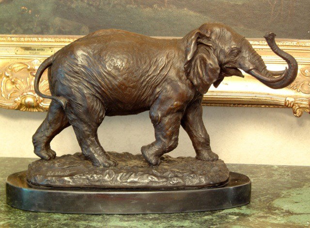 SM428 - Unique Bronze Sculpture Elephant: Elephant Bronze Sculpture, After Debvt, 11 "H x17"W x 7"D32 lbs. This bronze sculpture was produced using the "Lost Wax" casting method. The"Lost Wax" Cast method is the most precise metal casting tec