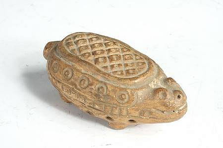 MAYAN POTTERY RATTLE -: Childs Turtle-Form Baby Rattle, Late Classic Period, Pacific Coast, AD 600-900, having thumb-grip texture on top, perforations on sides for sound release, 3 3/8in long MWF484