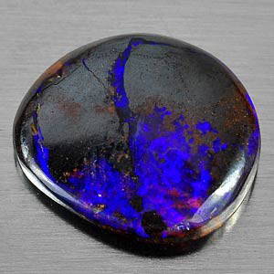 4.60 Ct. Natural Multi Color Matrix Opal.: Matrix opal consists of thin seams or spots of precious opal in matrix. The matrix is usually dark ironstone, but occasionally a light sand stone. Also called Mass opal. MWF394