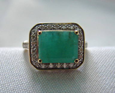 Ravishing 4.65 cts Emerald and .60cts Diamond ring