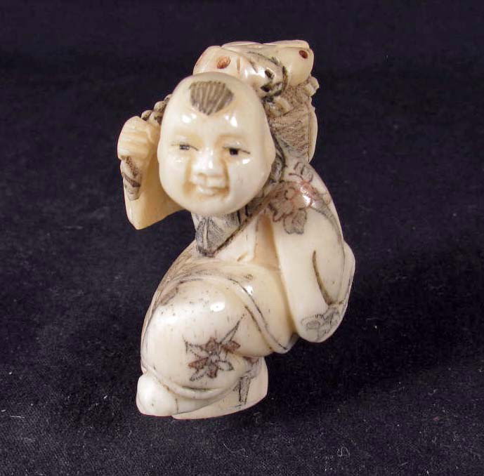 CARVED OX BONE NETSUKE
