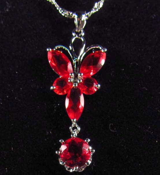 8284 - WHITE GOLD PLATED RUBY & TOPAZ PENDANT W/ C