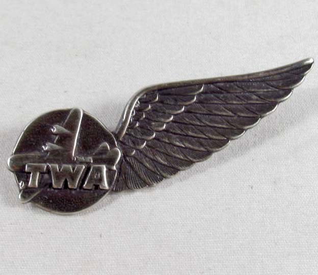 VINTAGE TRANS WORLD AIRLINES TWA STEWARDESS FLIGHT : Approx. 3/4" by 2 1/16". Maker marked LGB Sterling. Pinback.