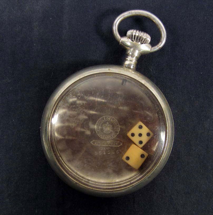 OLD WEST COWBOY ERA GAMBLING DICE GAME: Mounted in a vintage pocket watch case. Approx. 2 1/8" diameter