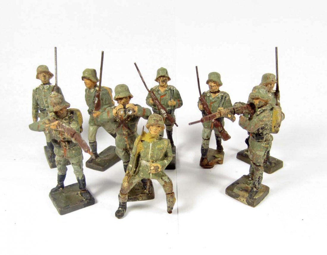 LOT OF 9 C. 1930'S GERMAN LINEOL TOY SOLDIERS: Marked on the bottom Lineol Germany