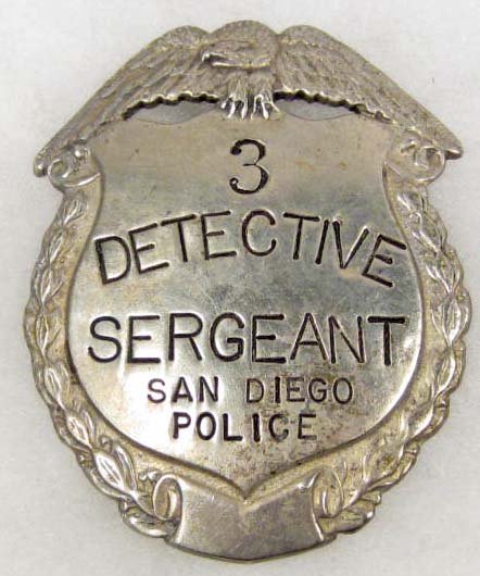 VINTAGE SAN DIEGO POLICE DETECTIVE SERGEANT NO. 3 : Approx. 2" by 2.5". Pinback. This is an eagle top badge w/ a shield below. Nickel construction.