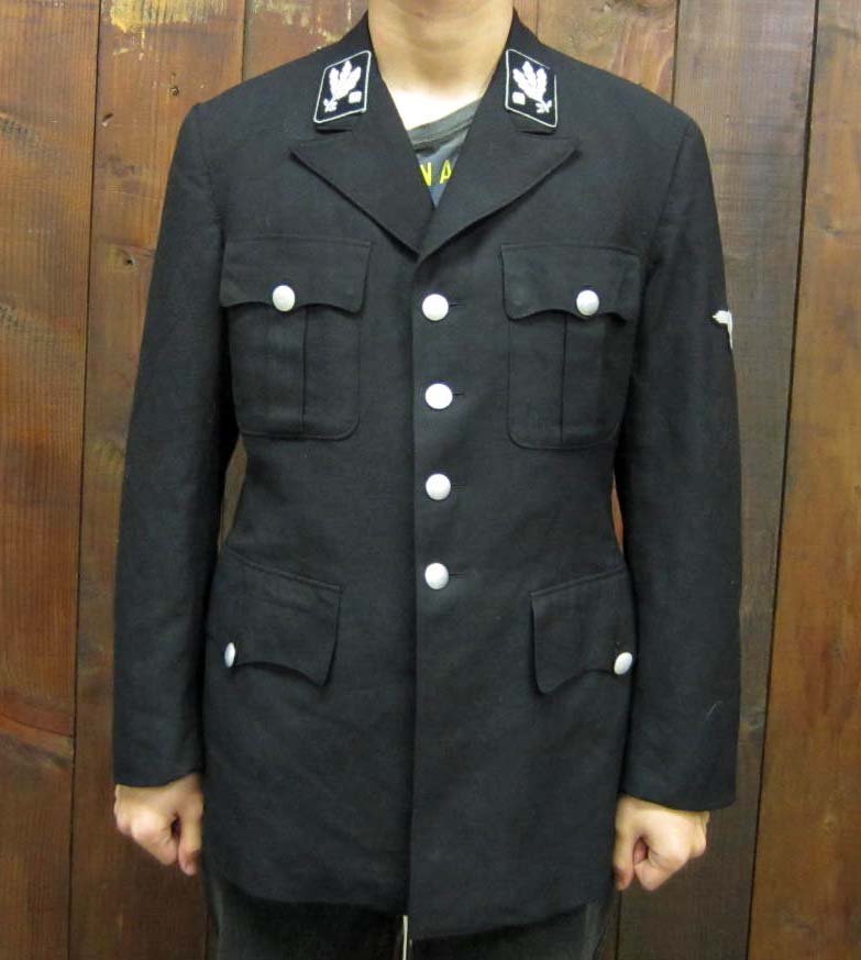 GERMAN NAZI ALLGEMEINE SS GENERALS TUNIC: Medium size. Has a pair of General collar tabs sewn onto the collar. there is an SS Eagle on the left arm. The body is a black cotton whip cord material.