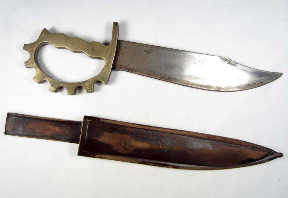 RARE US ARMY RANGER BRASS KNUCKLE KNIFE W/ LEATHER: Approx. 16 1/16" long overall. The brass handle is marked Australia Has a steel bowie type blade that is approx. 8.75" long overall. Includes the brown leather scabbard. Rare combat side arm. ***CANNO