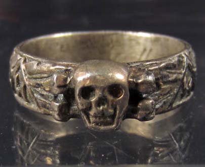 GERMAN NAZI WAFFEN SS TOTENKOPF HONOR RING: Has the skull and cross bones on the front w/ a swastika and SS runics around the sides. The inside is engraved H. Himmler.