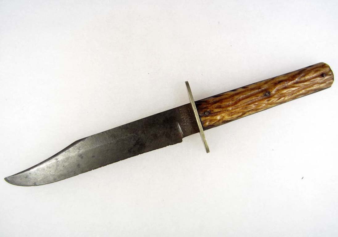 OLD WEST CHALLENGE CUTLERY CO SHEFFIELD ENGLAND BOW: Approx. 9 3/4" long overall. Has a pair of stag antler grips w/ one being chipped. The blade is steel.