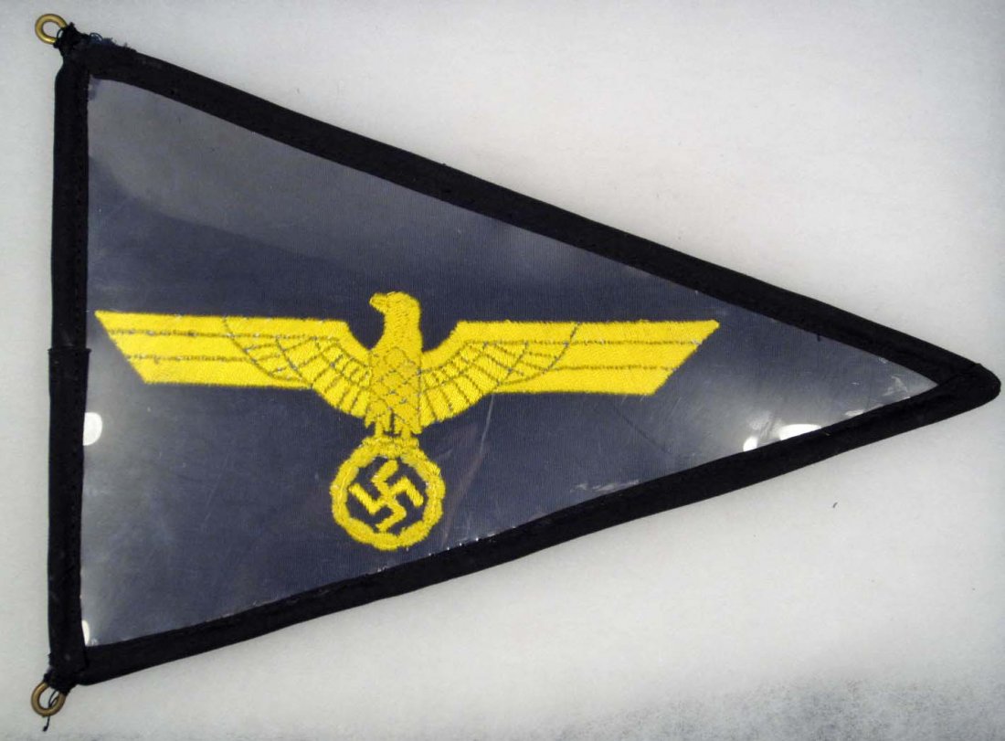 RARE GERMAN NAZI ARMY GENERALS STAFF CAR PENNANT: Approx. 10 1/8" by 13 7/8". Has a gold embroidered eagle in the center holding a swastika mounted on a metal brass and cloth frame. Has a clear celluloid cover on this double sided pennant.