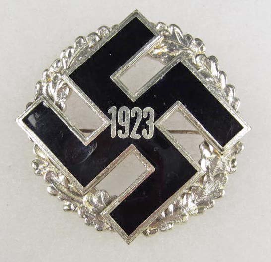 GERMAN NAZI 1923 GENERAL GAU HONOR BADGE: Pinback. 2 piece nickel construction w/ a black enameled swastika in the center.