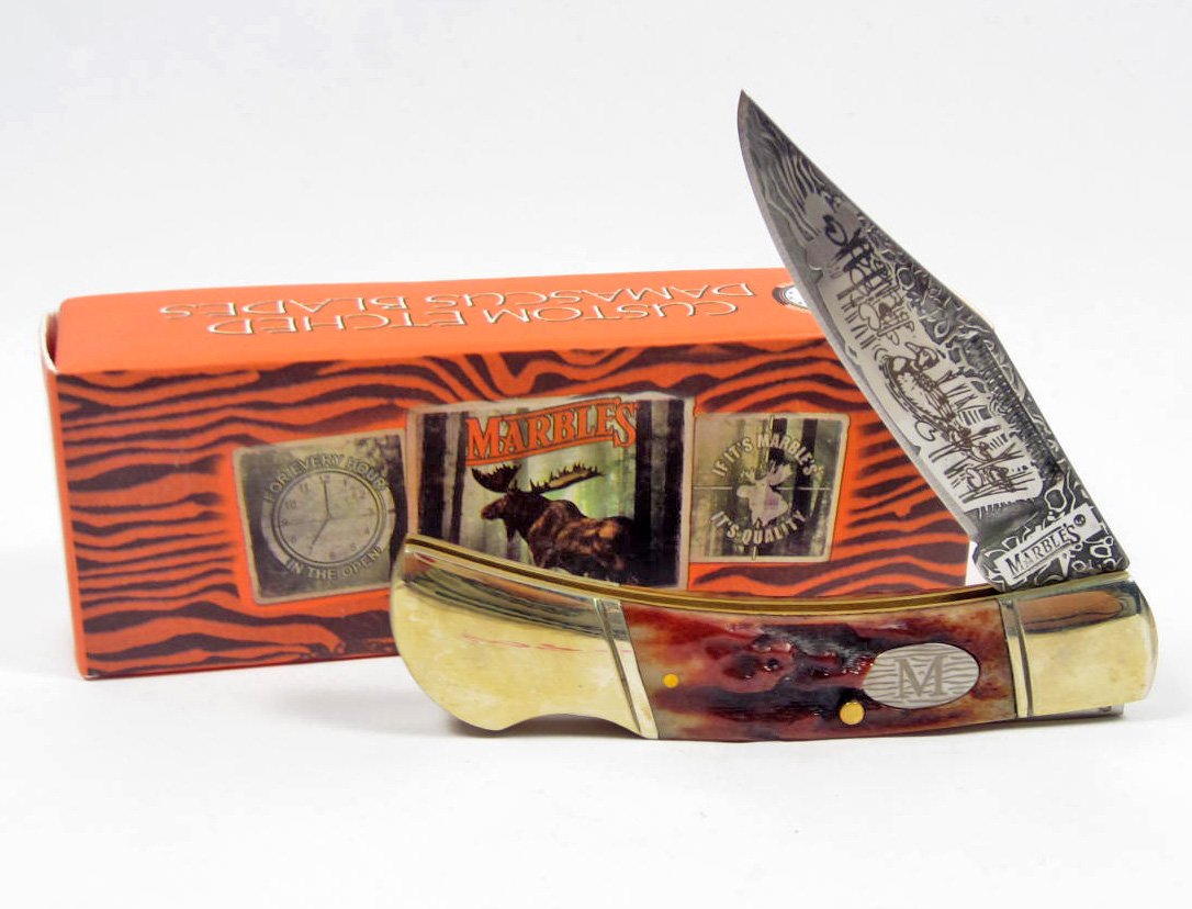 6099 - MARBLE'S WILDLIFE SERIES LOCKBACK KNIFE - D: Acid etched damascus like pattern stainless steel blades, Duck design on master blade, Rough jigged brown bone handle, Brass pins and liners, Nickel silver ringed bolsters, Damascene shield, 3.50" clo