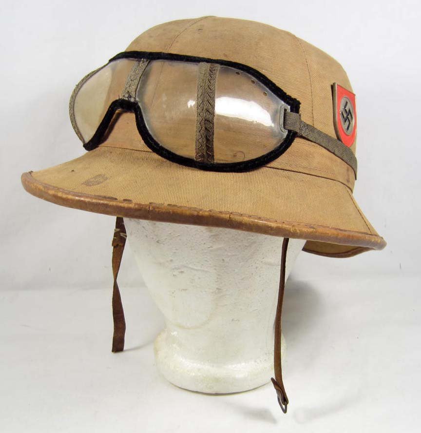 RARE GERMAN NAZI WAFFEN SS AFRIKA KORPS PITH HELMET: Includes the desert sun goggles. Has an SS lightning bolt and a swastika shield on each side. Tan canvas construction.