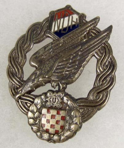 GERMAN NAZI LUFTWAFFE CROATION PARATROOPER FALLSCH: Pinback. Stamped nickel and enamel construction.