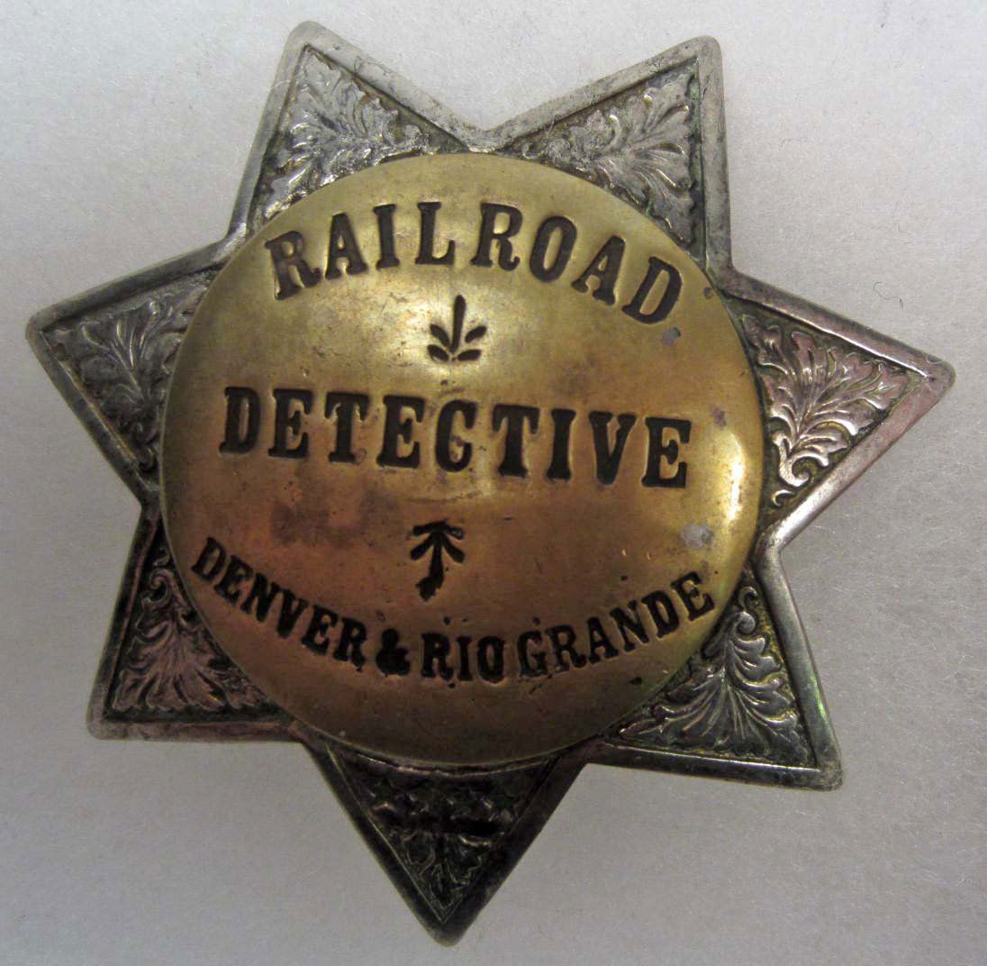 OLD WEST DENVER & RIO GRANDE RAILROAD DETECTIVE LA: Approx. 2 7/8" diameter. Maker marked Sun Badge Co L A County. Pinback. Two piece brass and nickel construction. This is a seven pointed star.