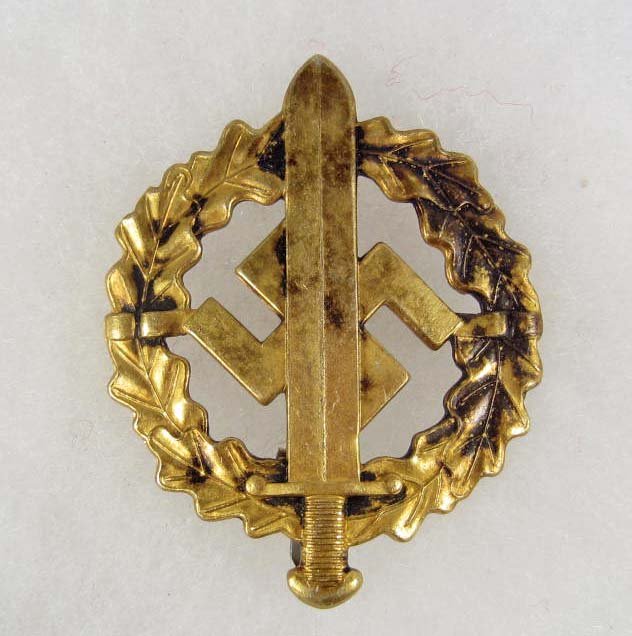 GERMAN NAZI GOLD SA BROWN SHIRTS SPORTS BADGE: Maker marked w Redo Igentum D Obersten A Fuhrung Saar = Lautern. Has a wide vertical pinback.