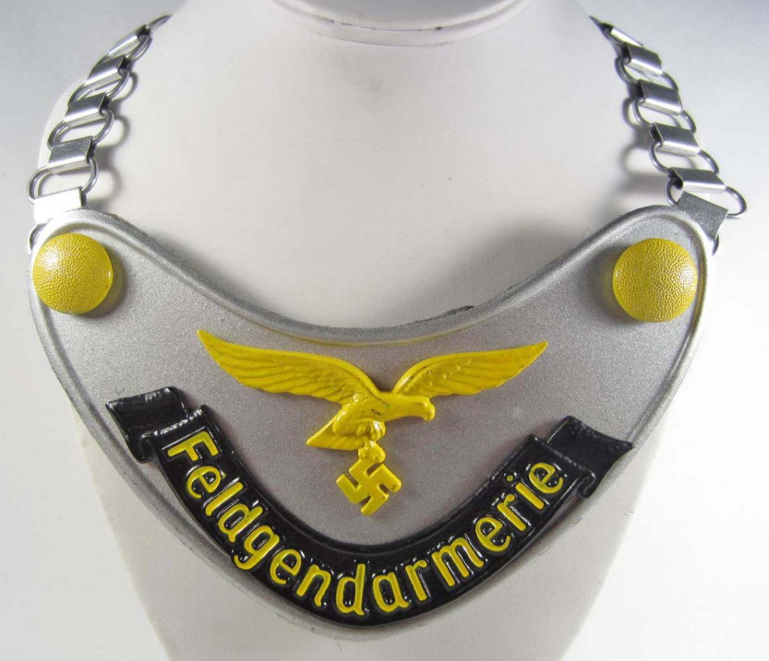 GERMAN NAZI LUFTWAFFE FELDGENDARMERIE GORGET W/ NE: The chain is aluminum. Has a grey wool backing. The body is steel construction.