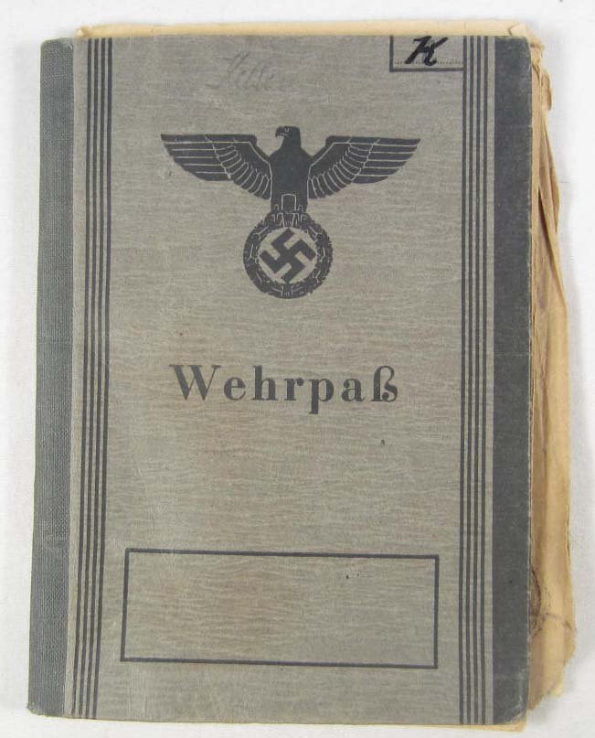 GERMAN NAZI ARMY WEHRPASS TO A SOLDIER IN A PANZER G: Has a photo on the second page. His name is Erich Keller and there are many entries in the pass. Shows that he had experience shooting a Gewehr 98 K; MG 34; MG 42; Pistol 08; Pistol 38 and a Stielhand