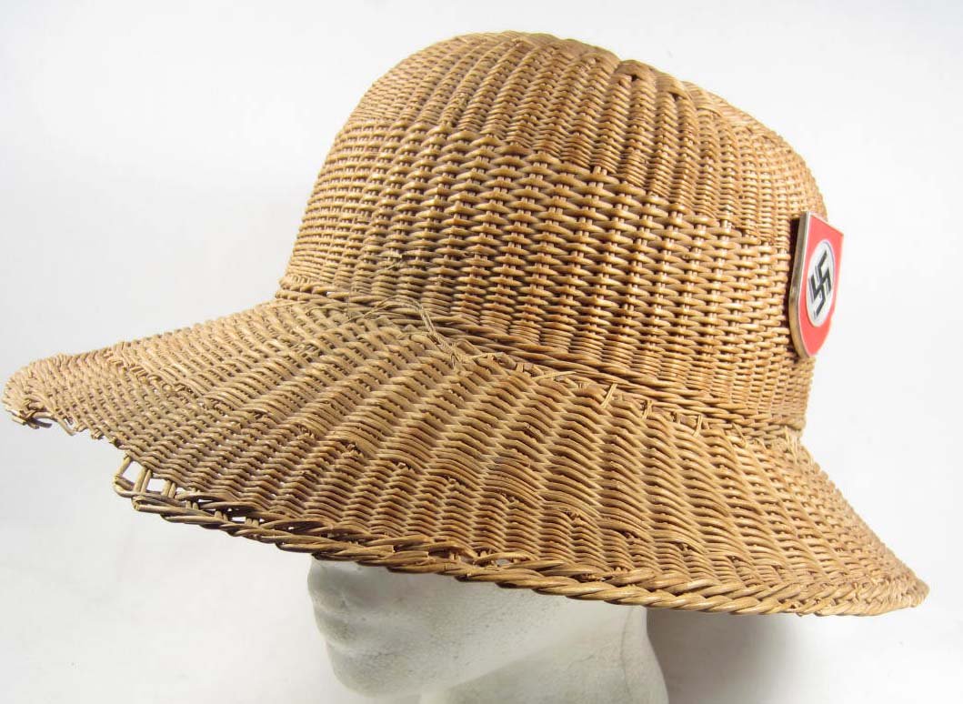 RARE GERMAN NAZI WAFFEN SS AFRIKA KORPS WICKER PIT: Many breaks and few repairs to the wicker Aluminum SS Shield on one side of the helmet and an aluminum swastika shield on the other. Rare piece of head gear.