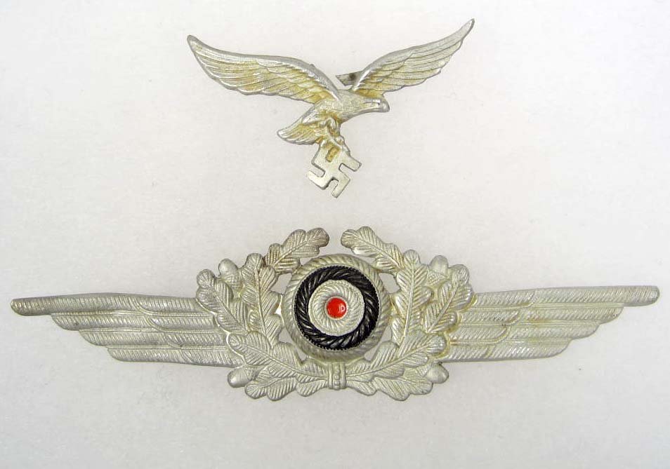 PAIR OF GERMAN NAZI LUFTWAFFE VISOR HAT BADGES