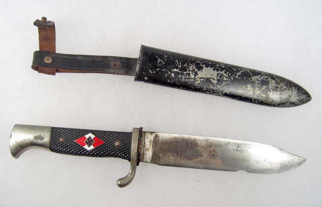 GERMAN NAZI HITLER YOUTH HJ UTILITY KNIFE W/ SCABBA: Approx. 10" long overall. The steel blade is maker marked RZM M7/31. Includes the metal scabbard w/ a black leather belt hanger.