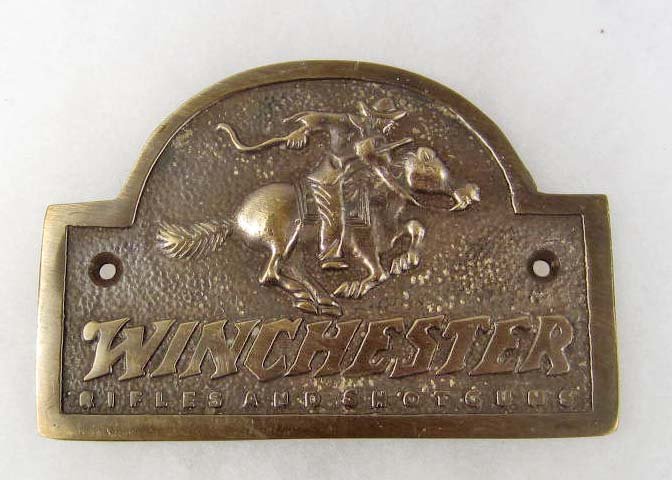 WINCHESTER RIFLES AND SHOTGUNS BRASS SIGN: Approx. 7" by 5"