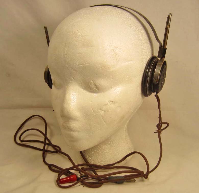 GERMAN NAZI ARMY PANZER PANTHER TANK KORPS HEAD PH: They are maker marked EH333-2000 Telefunken DRGM. Includes the cloth covered wire plug in cord