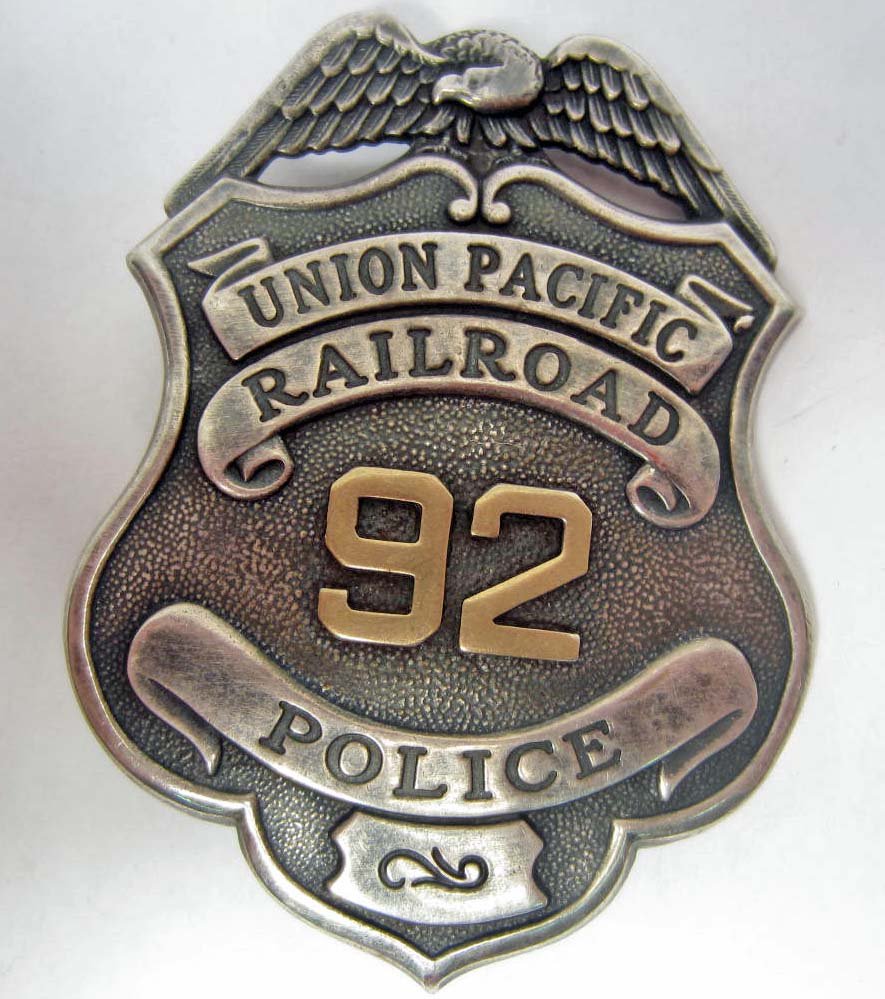 OLD WEST UNION PACIFIC RAILROAD #92 POLICE LAW BADG: Approx. 2 1/4" by 3". This is an eagle top badge w/ a shield below. Three piece nickel and brass construction. Very fine detail