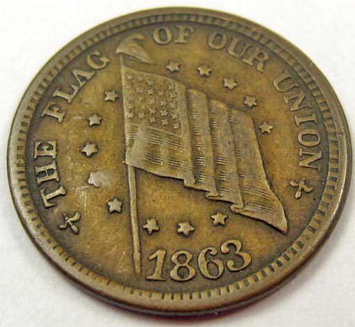 1863 CIVIL WAR TOKEN - THE FLAG OF OUR UNION: One side has a picture of the US Flag and reads The Flag of Our Union 1863. The other side reads If Anybody Attempts to Tear it Down Shoot Him on the Spot DIX