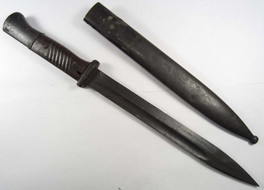 GERMAN NAZI ARMY MAUSER K-98 COMBAT RIFLE BAYONET W/ SC: Approx. 16" long overall. Steel construction w/ a pair of brown bakelite handles.