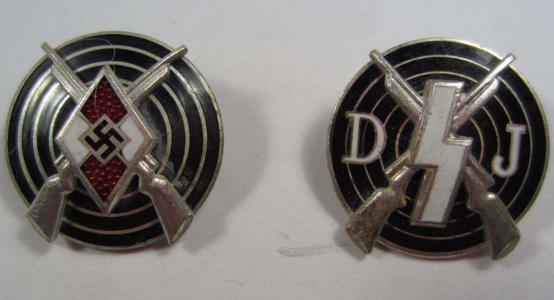 GERMAN NAZI HITLER YOUTH HJ & DEUTSCHE YOUTH DJ SHOOTIN: Pinback. Both are maker marked RZM. Two piece nickel and enamel construction.