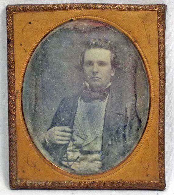 ANTIQUE DAGUERREOTYPE PHOTO OF MAN IN SUIT W/ VEST & PO: ANTIQUE DAGUERREOTYPE PHOTO OF MAN IN SUIT W/ VEST & POCKET WATCH CHAIN IN FRAME