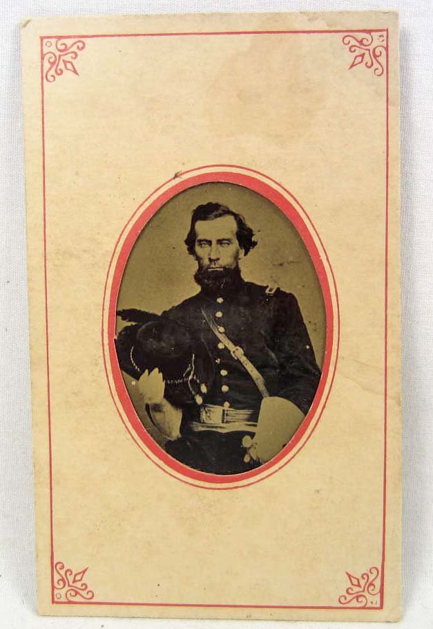 US CIVIL WAR ERA UNION ARMY GENERAL TIN TYPE PHOTO: Approx. 2 3/8" by 3 15/16". The soldier image is approx. 1 3/8" by 1 7/8". He is wearing his Generals uniform w/ a pair of white gauntlets. He is holding his hat in the right hand.