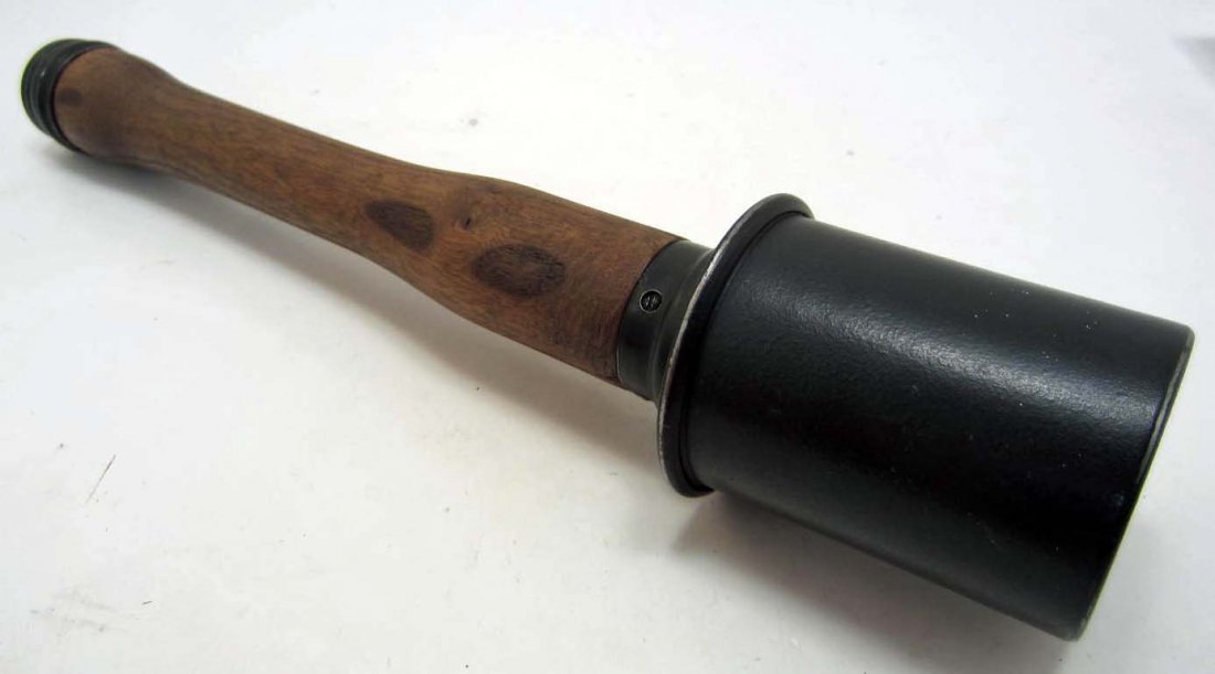 GERMAN NAZI ARMY POTATO MASHER STICK GRENADE: Approx. 13.5" long overall. The wood handle is marked Hz 39 w/ a waffen ampt eagle in the center. The green painted steel had is marked RR564 1939. Includes the white porcelain ball and string in the 