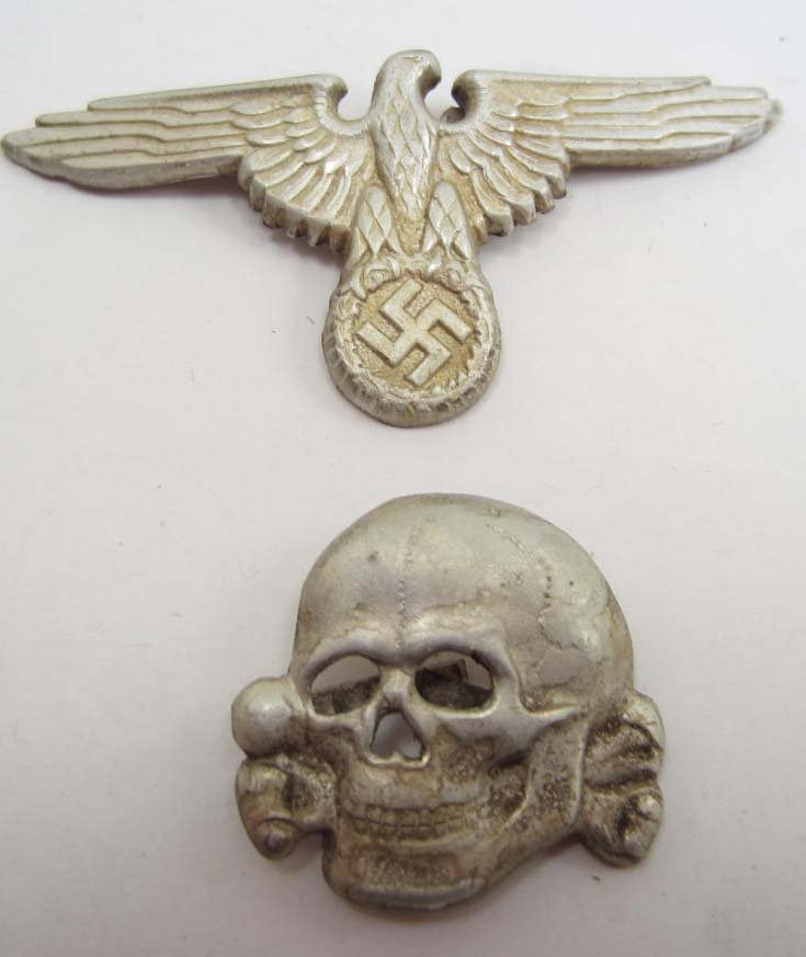 SET OF 2 GERMAN NAZI SS VISOR HAT BADGES: N/A