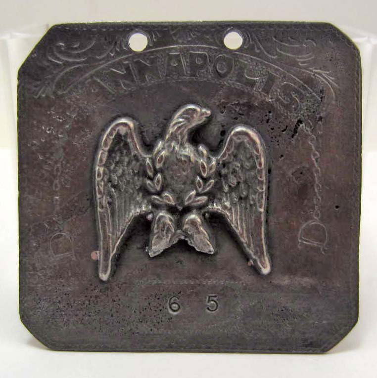 ANNAPOLIS PUBLIC SLAVE AUCTION HOUSE METAL TAG: Front has an applied CSA Confederate Eagle in the Center & is Marked 'Annapolis' on top & '65' on Bottom. Back is Marked 'Annapolis Slave Quarters the Public Auction House 1802 - Strong & Healthy Afri