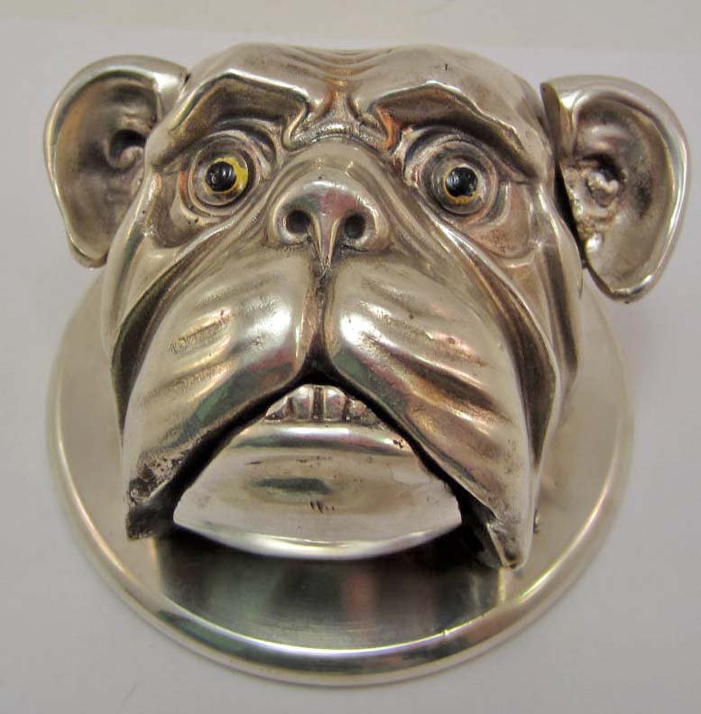 METAL BULLDOG WIND UP DOORBELL: Ears & Mouth Seem to Move in Order to Ring the Bell. May need repair as it doesn't ring every time the ears are moved. Approx. 5" x 4.5" x 3.5"