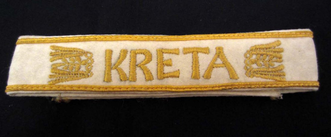GERMAN NAZI LUFTWAFFE PARATROOPER FALLSCHIRMJAGER KRETA: Machine embroidered on a white wool backing. full length. This was to have been worn on the lower left sleeve of the uniform.