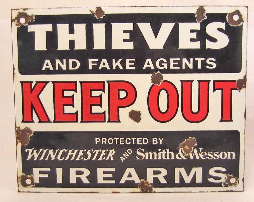WINCHESTER AND SMITH & WESSON FIREARMS PORCELAIN SIGN: Approx. 8" by 10". Front reads Thieves and Fake Agents Keep Out Protected by Winchester and Smith & Wesson Firearms.