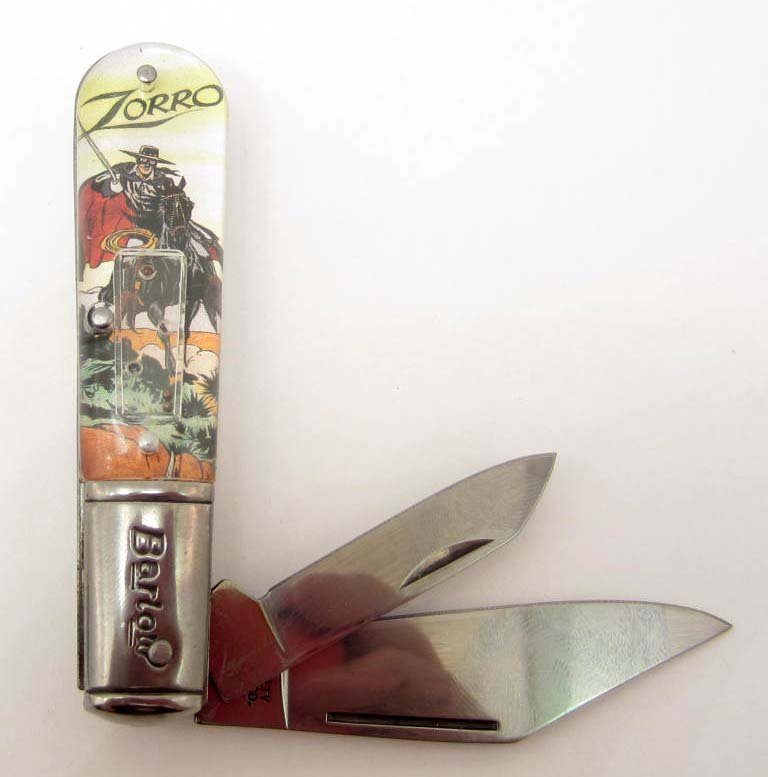 6910 - NOVELTY CUTLERY BARLOW ZORRO GAME ON HANDLE